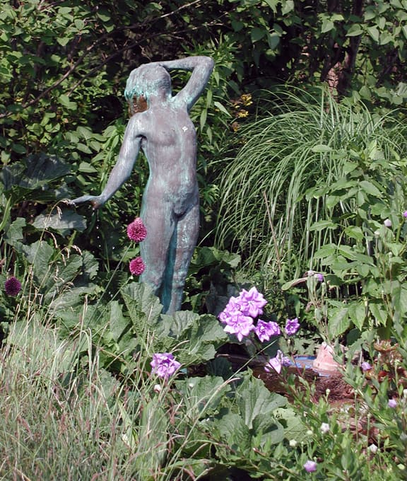 This lovely statue is at the Berkshire Botanical Gardens. Today, it seems to me that it represents how I'm likely to go into my day if I'm not careful. No, not thin and naked.... but with head thrown back with swirling thoughts, and not looking where I'm going... not considering what I want to grow.