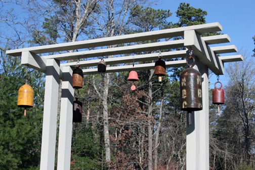 The bell on the left, and the two on the right, were made by Provincetown artist Michael Kacergis.